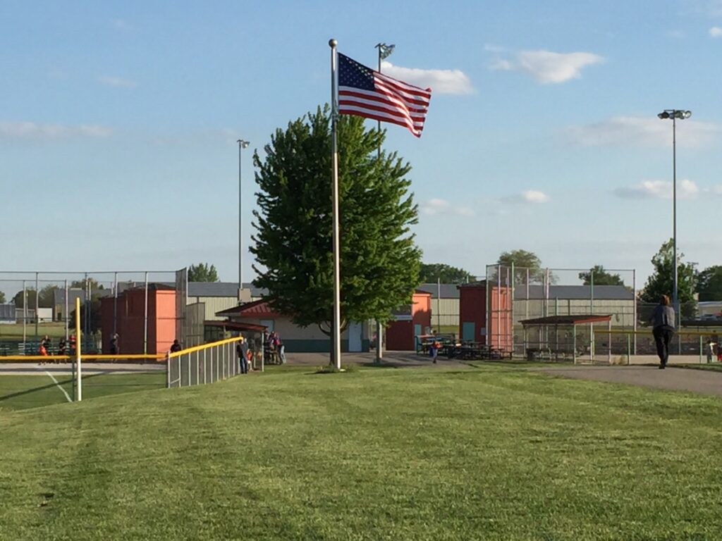 softball press boxes and flag